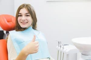 example of a woman comfortable with cavity treatment